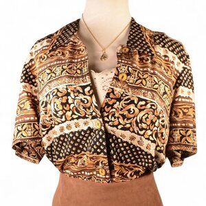 Fun button up top in Earth tones / coffee colors. Vintage